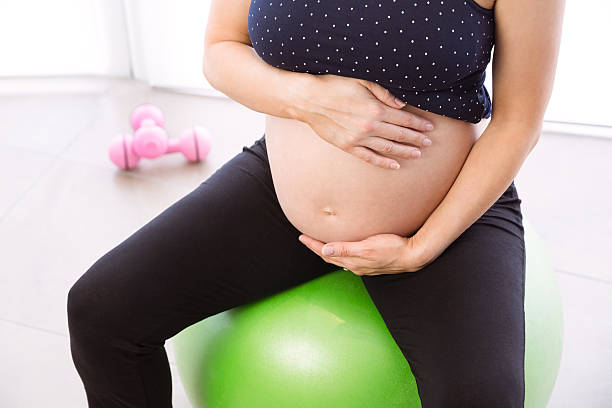 istock Pregnant woman keeping in shape 491619058