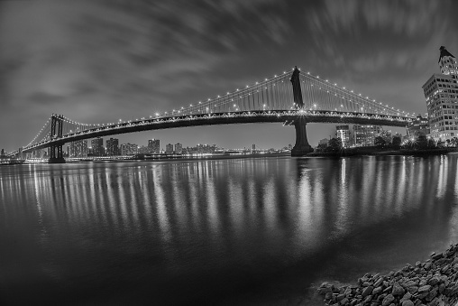 new york manhattan night view from dumbo brooklyn in b&w