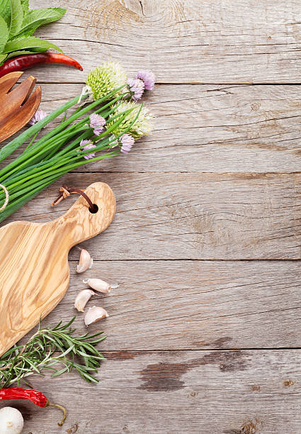 istock Fresh herbs and spices on garden table 491621202