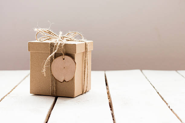 istock Christmas present on a wooden background 491629880