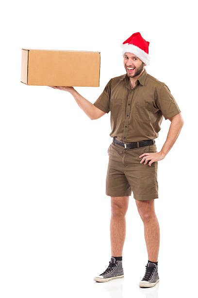 istock Laughing Christmas Messenger Holding Carton Box 491630130
