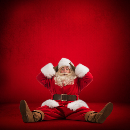 Happy Santa Claus on red background