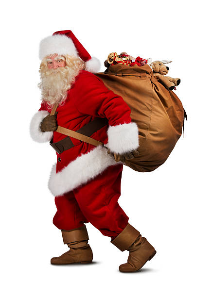 Santa Claus on the run to delivery christmas gifts isolated stock photo