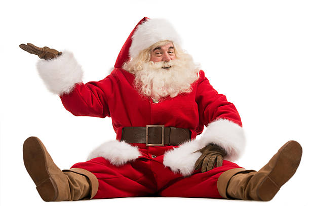 Hilarious and funny Santa Claus showing presenting gesture stock photo