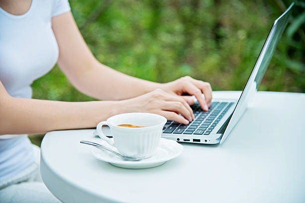 istock Woman typing outside 491640826