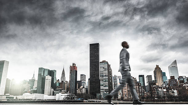 istock Successful business man looking away against the skyline 491641462