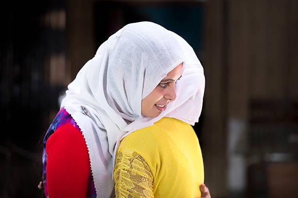 istock Two Happy Muslim women embracing each other on Eid. 491642884