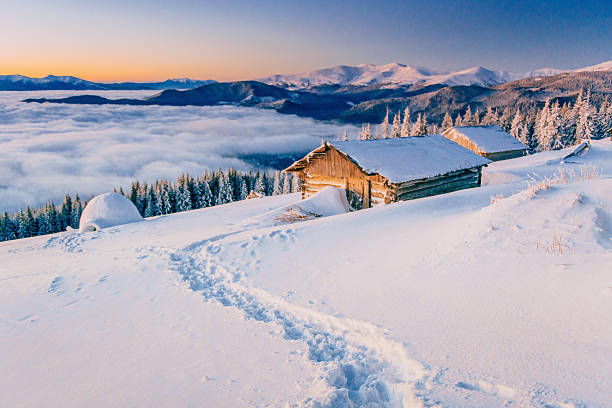 istock chalets in the mountains at sunset 491643672