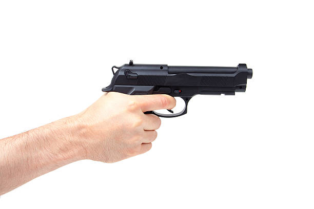 istock Man's hand holding gun, isolated on white 491644188
