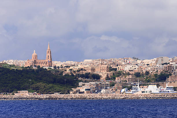 View on city Mgarr Malta View on city Mgarr on the small island of Gozo - Malta mgarr malta island gozo cityscape with harbor stock pictures, royalty-free photos & images