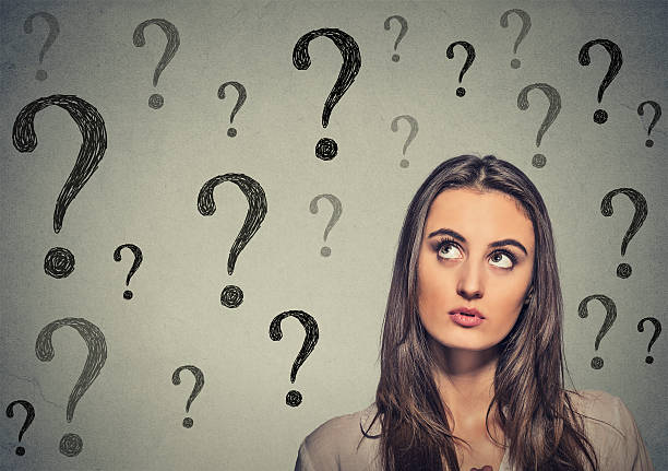 istock beautiful woman thinking looking up has many questions 491645734