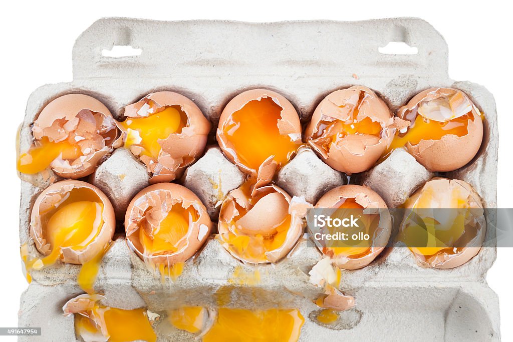 Broken eggs in a box Broken eggs in a egg box - misfortune Animal Egg Stock Photo