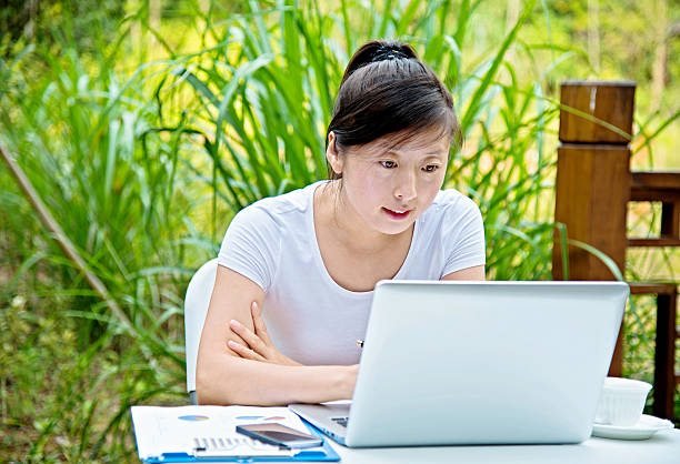 istock Young woman working outdoors 491652712