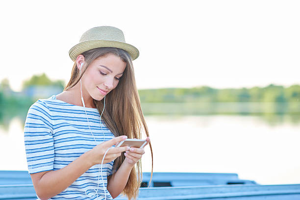 istock Keeping her friends updated on her vacation 491653602
