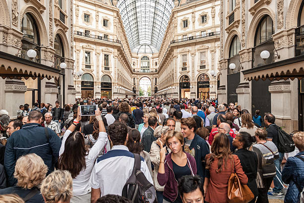 Crowd in the "Galleria Vittorio Emanuele" in Milan stock photo