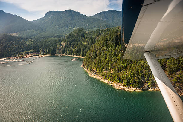 istock Water seaplane flying over the vancouver landscape 491659112
