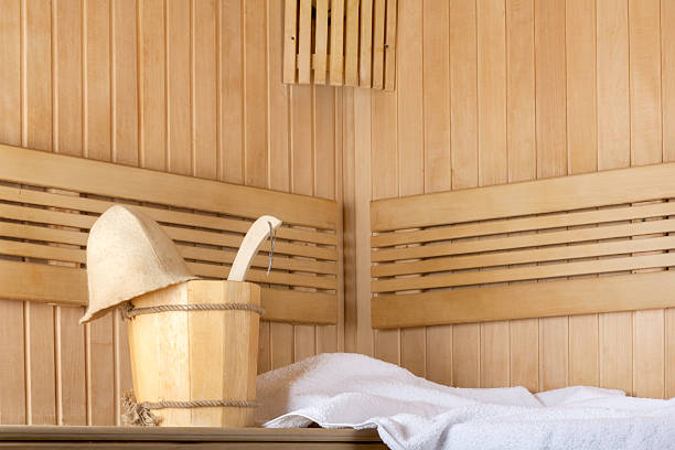 istock Traditional wooden sauna for relaxation with bucket 491663177