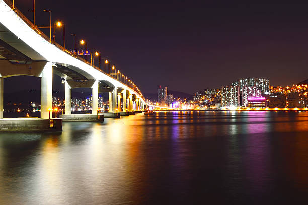 skyline at night with Seo-gu district and Namhang bridge in Busan, South Korea