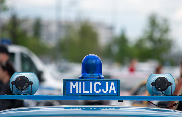 istock Polish Milicja (Old Police) sign on a old car 491664457