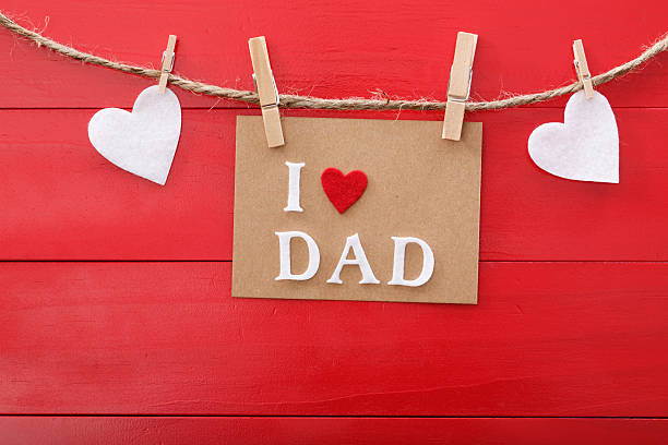 istock Fathers day message over red wooden board 491664839