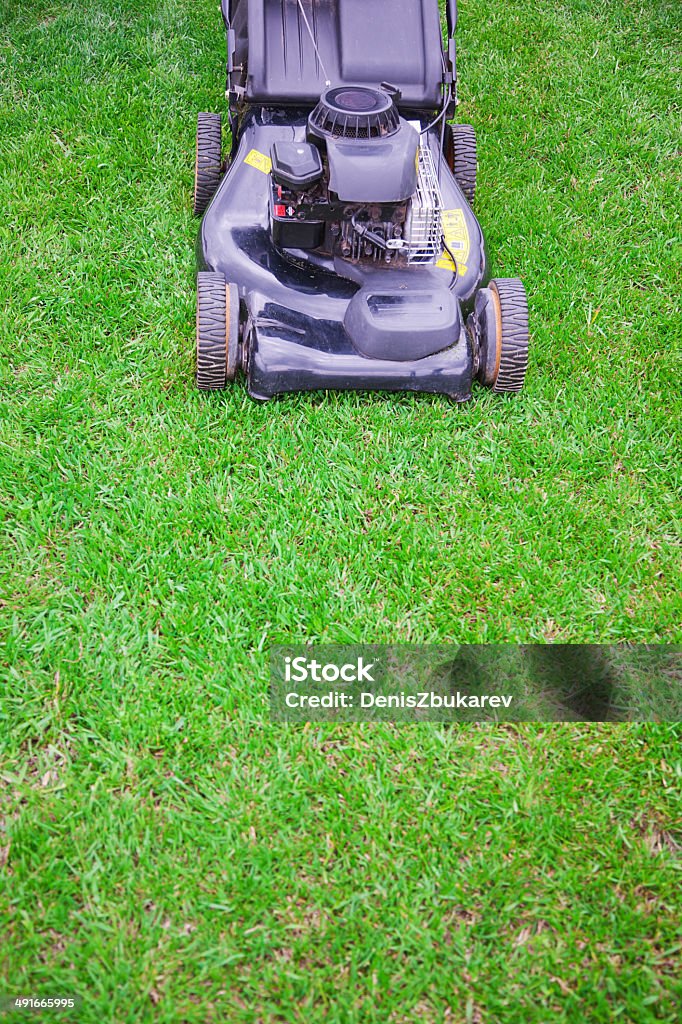 mowing grass Activity Stock Photo