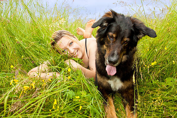 istock caucasian woman with her dog 491667109