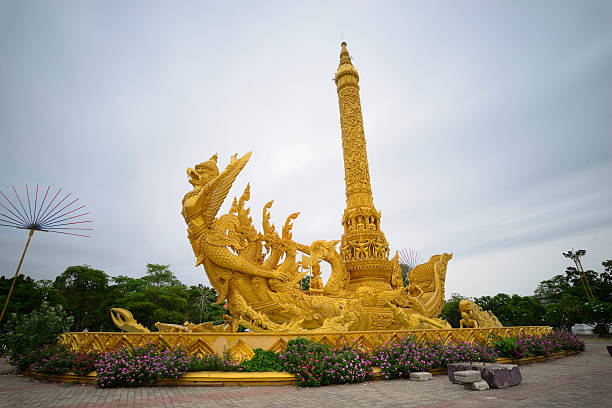 golden art sculpture at Tung Sri Muang park in Ubon Ratchathani province, Thailand