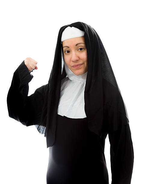 istock Young nun showing off her muscle 491670449