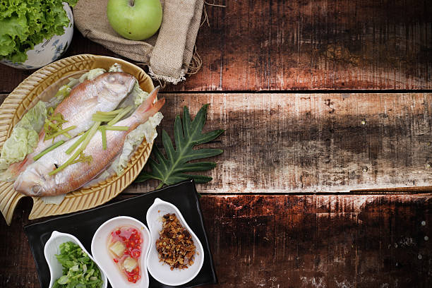 istock Fish  with Herbs and Spices on Top Wooden 491672130