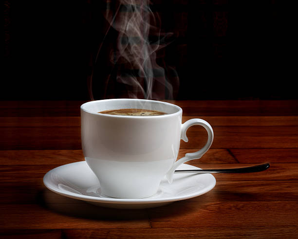istock Hot fresh coffee in a white cup with sugar 491681247