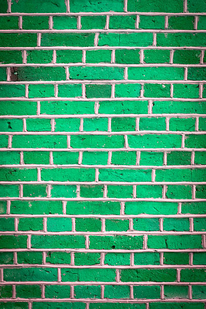 istock Background texture of a green brick wall 491681731