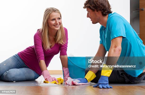 Cleaning The Floor Stock Photo - Download Image Now - Adult, Apartment, Arranging