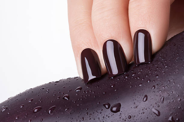 istock Purple nail polish 491683238