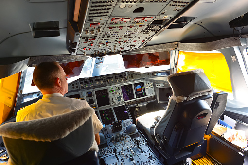 Bangkok, Thailand - March 31, 2015: Emirates Airbus A380 cockpit interior. Emirates is one of two flag carriers of the United Arab Emirates along with Etihad Airways and is based in Dubai.