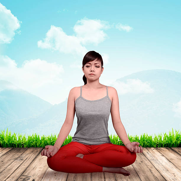 istock Asian woman doing yoga 491687204