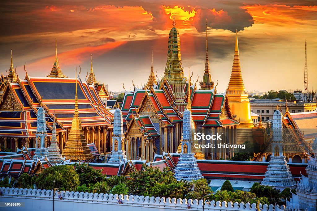 Grand palace and Wat phra keaw Grand palace and Wat phra keaw at sunset Bangkok Stock Photo