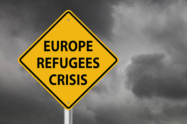 istock Refugees crisis warning sign 491701546