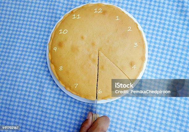 Cutting A Butter Cake Stock Photo - Download Image Now - Cake, Clock, Cross Section