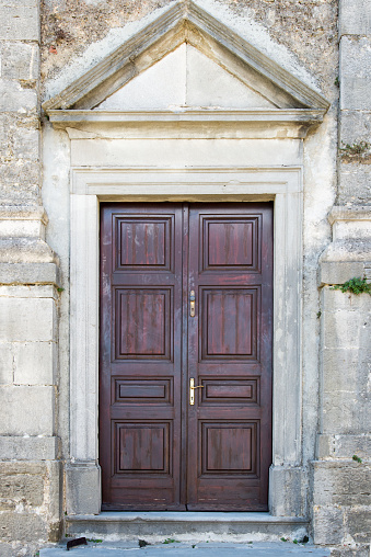 the double wing brown wood front door