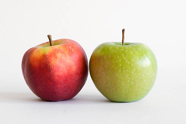 Red and green apple on white stock photo