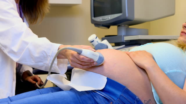 Doctor performing an ultrasound
