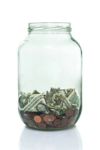 istock Glass jar with some money in the bottom 491703335