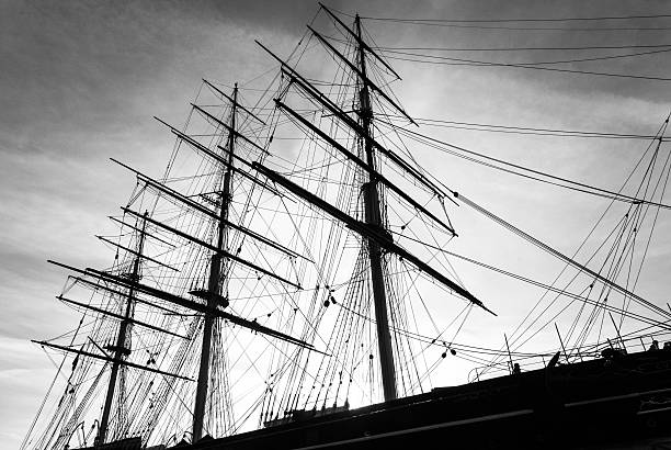 istock Ship's Masts - Sailing Ship's Masts and Rigging in silhouette 491704111