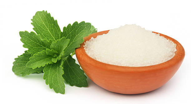 stevia mit zucker - sugar leaf stock-fotos und bilder