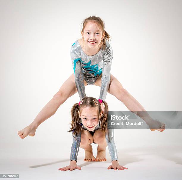Sporting Sisters Stock Photo - Download Image Now - Twin, Gymnastics, Leotard