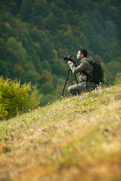 istock Landscape photographer in action 491705429