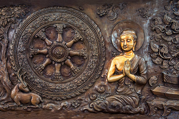 istock Buddha life scenes on carved metal . 491706401