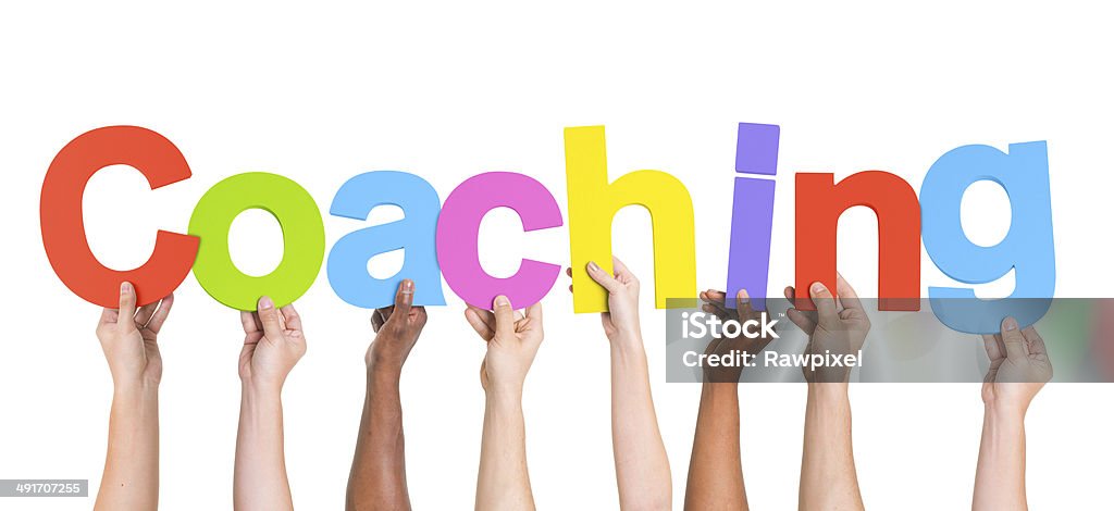 Diverse Hands Holding The Word Coaching Coach Stock Photo