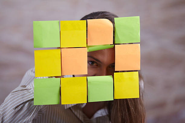 istock Businesswoman pointing on whiteboard 491707946