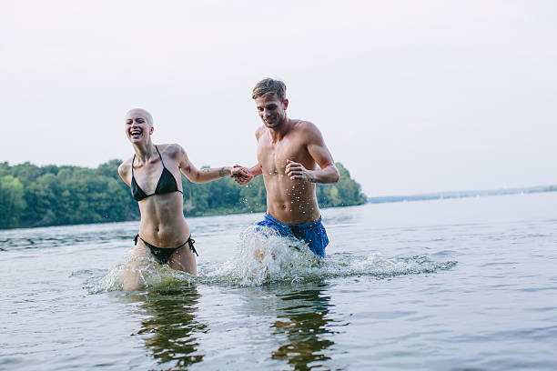 istock Running together in the lake in the evening light 491710082